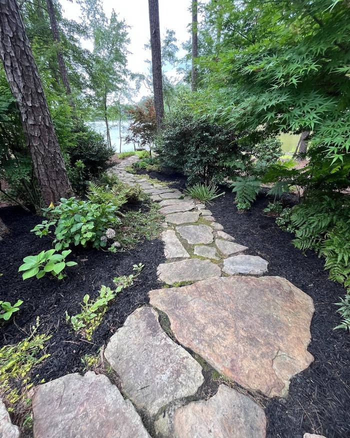 Flagstone path through a shade garden