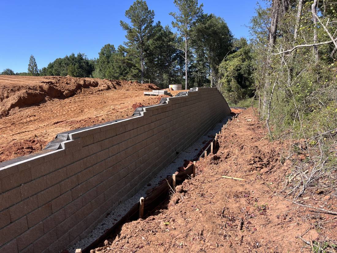 Tall segmental block retaining wall on a commercial site